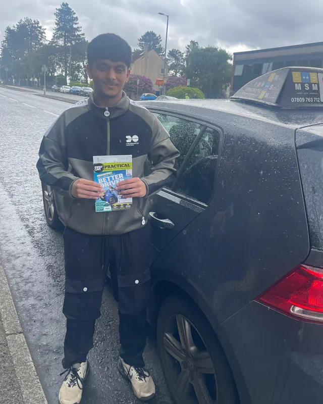 Fiaz beside the MSM car after passing at Anniesland